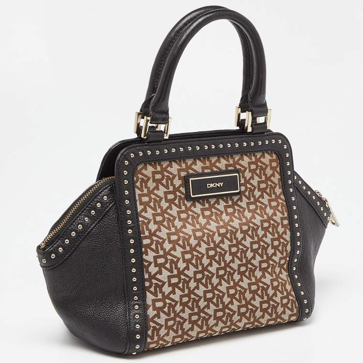 Pre Owned DKNY Beige/Black Signature Canvas and Leather Studded Satchel