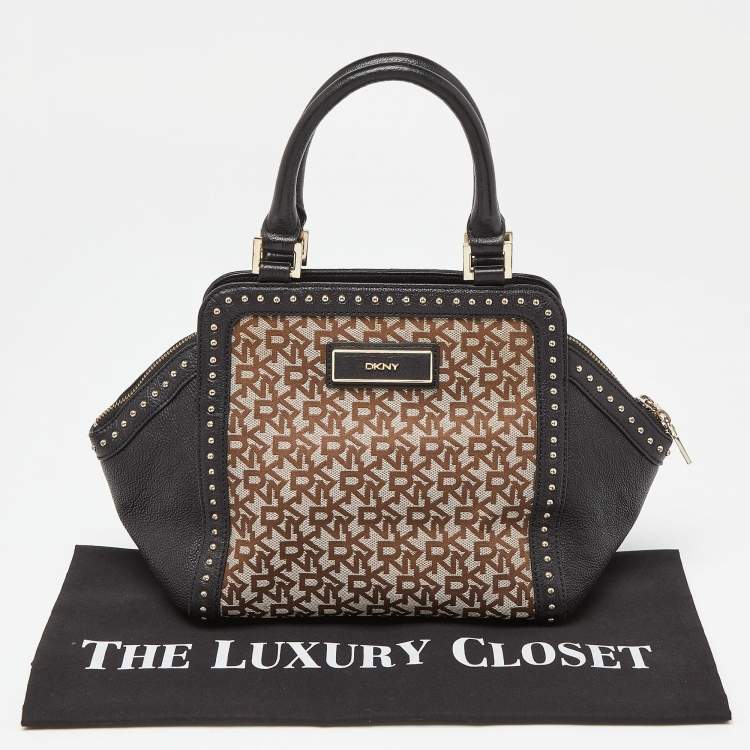 Pre Owned DKNY Beige/Black Signature Canvas and Leather Studded Satchel