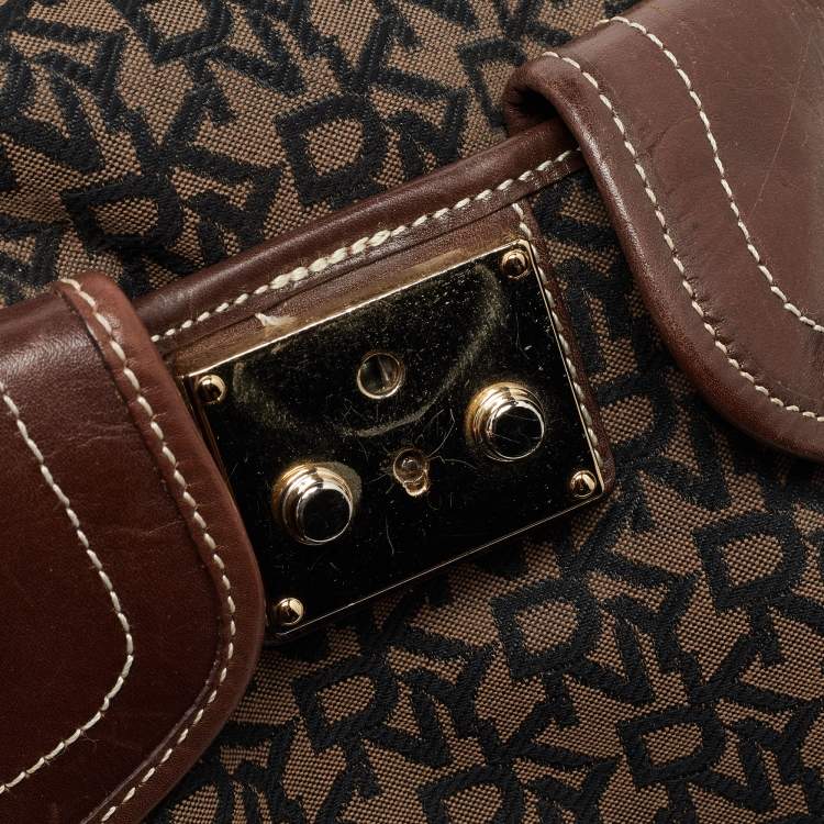 Pre Owned Dkny Brown/Black Signature Canvas and Leather Front Pocket Tote