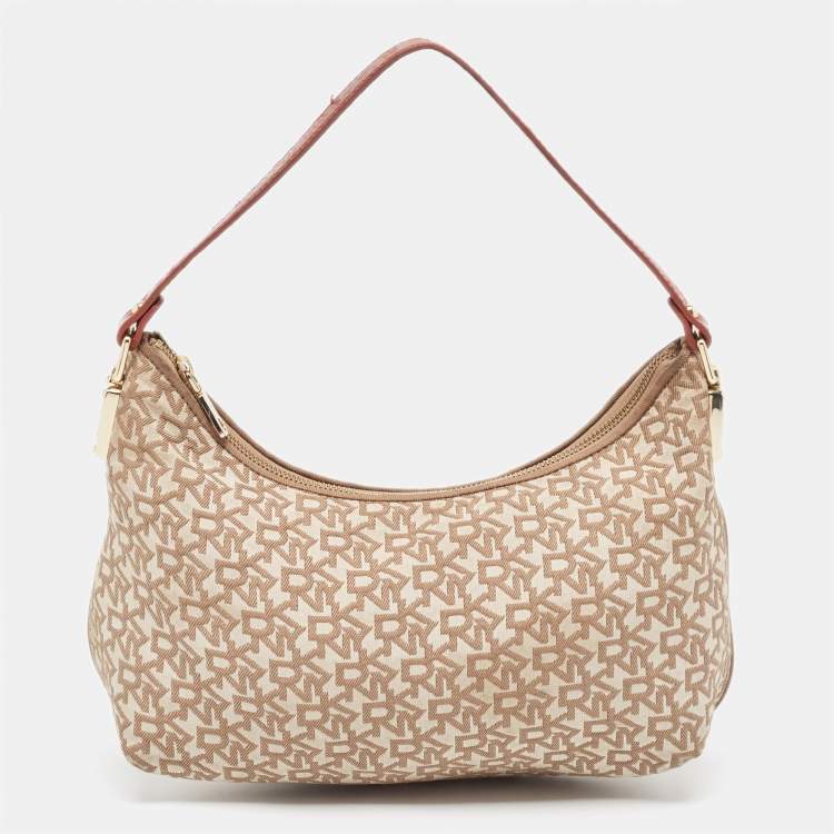 https://cdn.theluxurycloset.com/uploads/opt/products/750x750/luxury-women-dkny-used-handbags-p924329-001.jpg