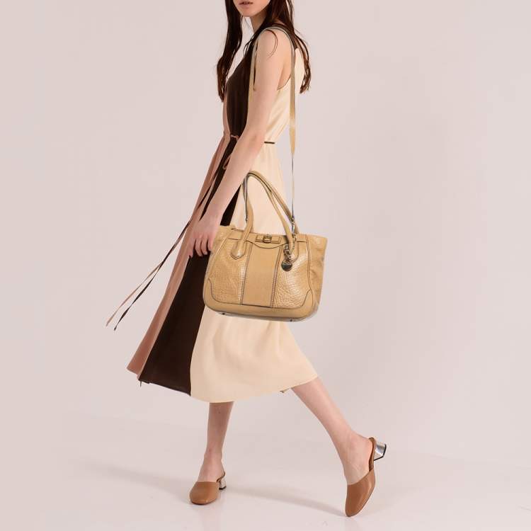 Pre Owned DKNY Beige Leather Logo Charm Shoulder Bag