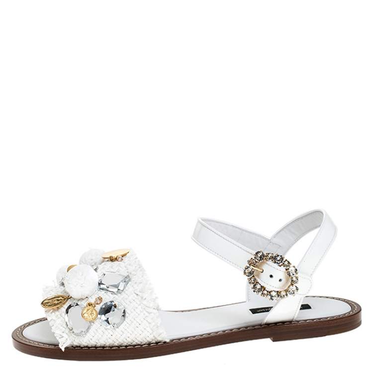 مملوكة مسبقًا Dolce & Gabbana White Patent Leather And Raffia Pom Pom Crystal Embellished Flat Sandals Size 36