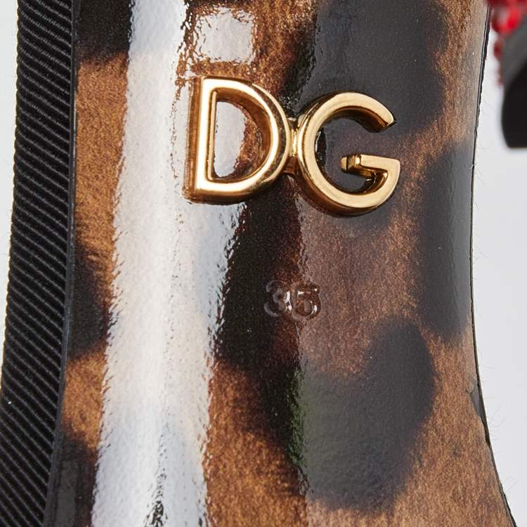 Pre Owned Dolce & Gabbana Beige/Black Leopard Print Canvas and Satin Rose Applique Ankle Strap Sandals Size 35