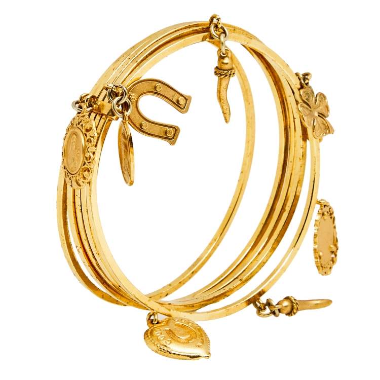 Pre Owned Dolce & Gabbana Gold Tone Charm Detail Multi Bangle Bracelet