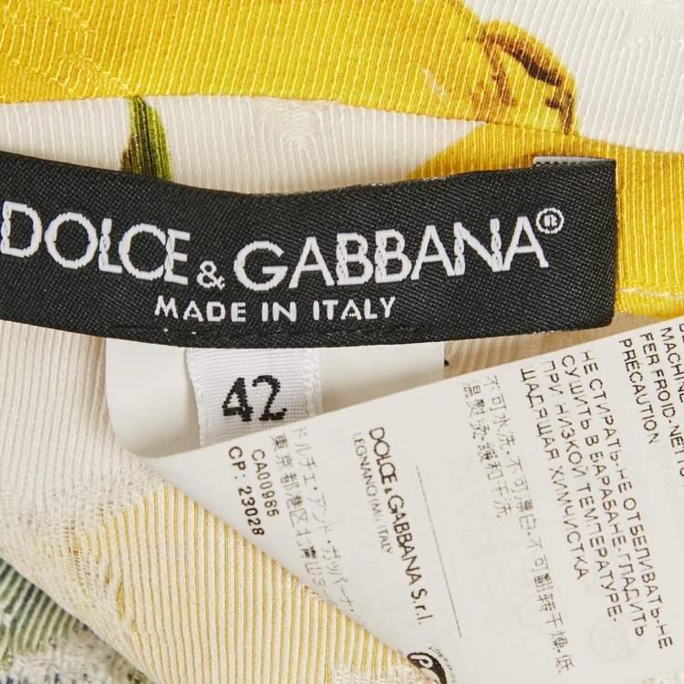 Pre Owned طقم بلوزة وتنورة دولتشي أند غابانا أبيض مزين بطبعات م/ل