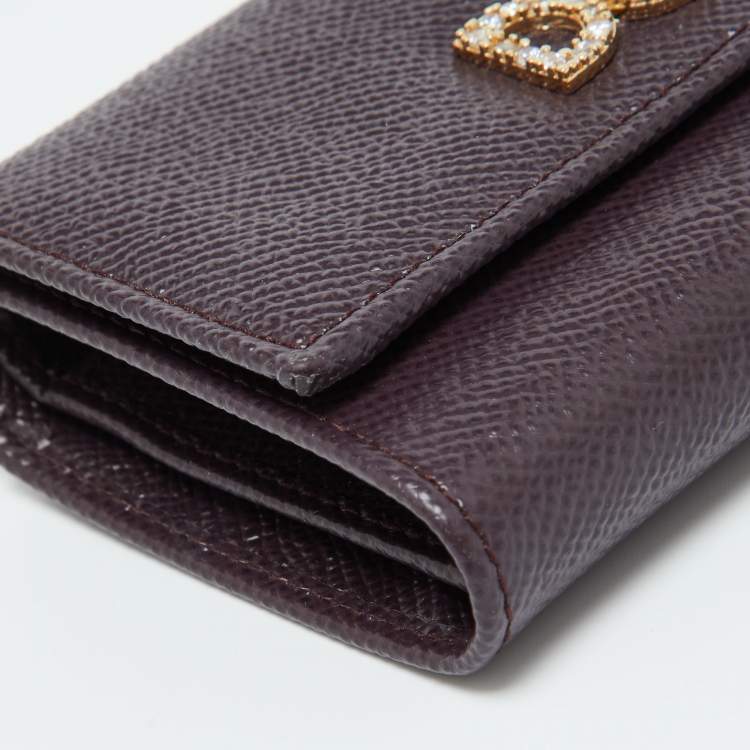 Pre Owned Dolce & Gabbana Burgundy Leather DG Crystals Trifold Wallet