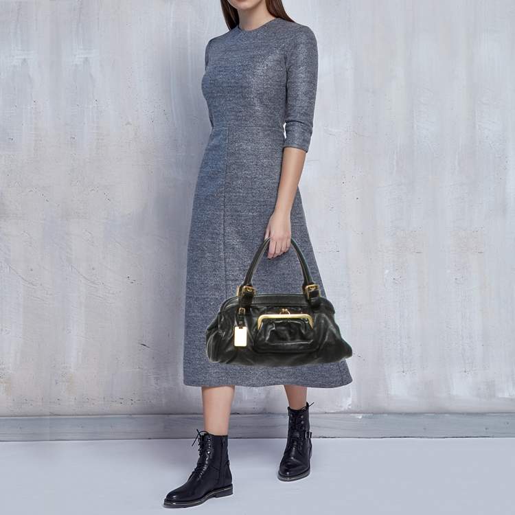 Pre Owned حقيبة إطار جلد أسود بجيب قفل دولتشي أند غابانا