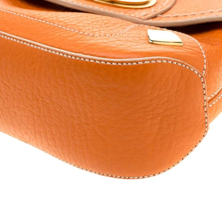 Pre Owned Dolce & Gabbana Orange Pebbled Leather Ring Shoulder Bag