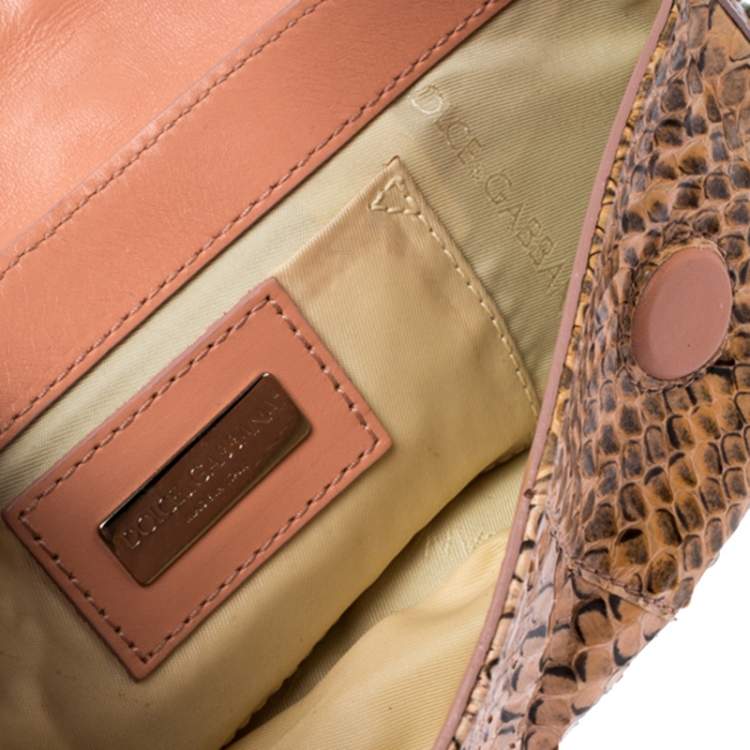 Pre Owned Dolce & Gabbana Peach Python Logo Embellished Wristlet Clutch