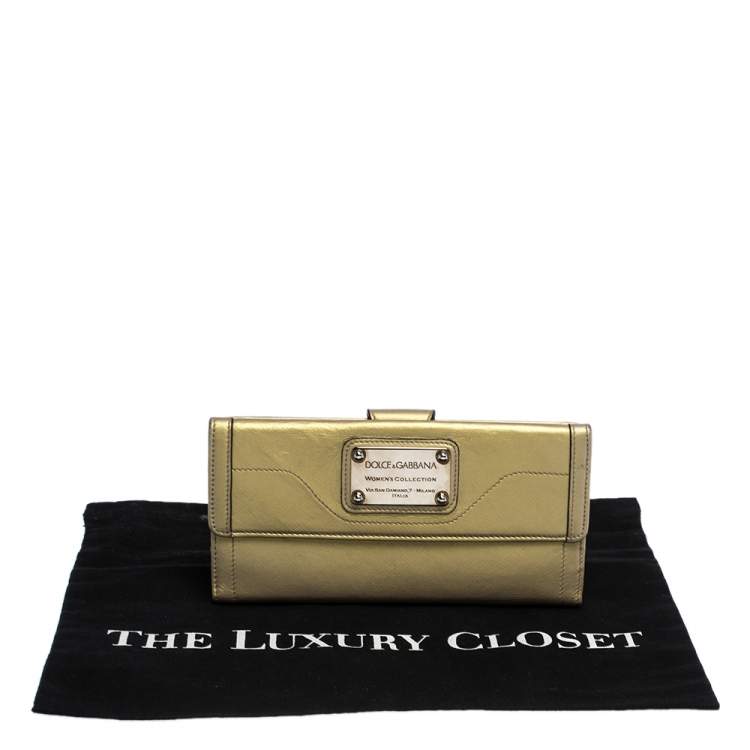 Pre Owned Dolce & Gabbana Metallic Gold Leather Logo Plaque Continental Flap Wallet