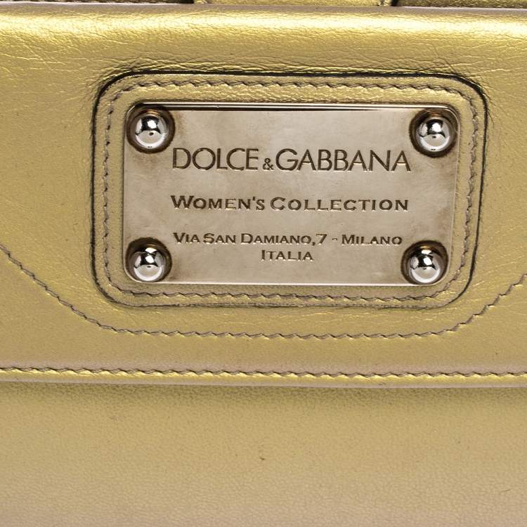Pre Owned Dolce & Gabbana Metallic Gold Leather Logo Plaque Continental Flap Wallet