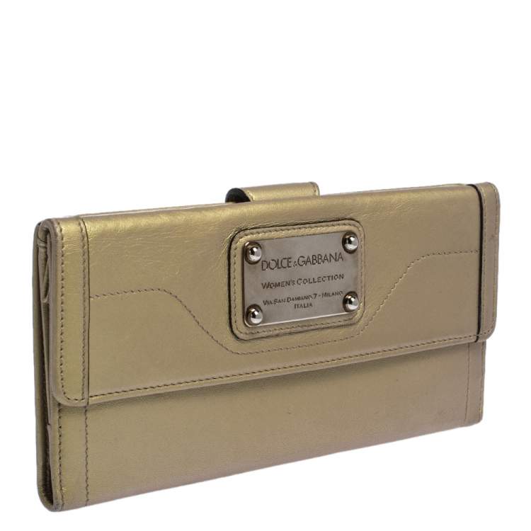 Pre Owned Dolce & Gabbana Metallic Gold Leather Logo Plaque Continental Flap Wallet