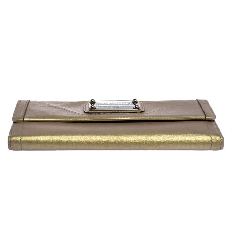 Pre Owned Dolce & Gabbana Metallic Gold Leather Logo Plaque Continental Flap Wallet