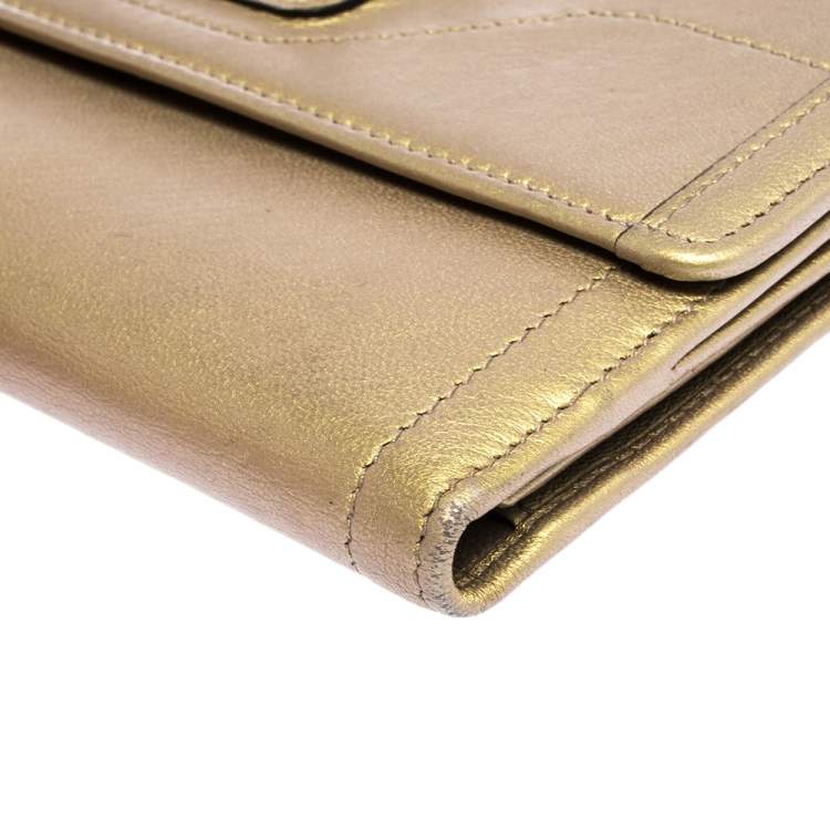 Pre Owned Dolce & Gabbana Metallic Gold Leather Logo Plaque Continental Flap Wallet