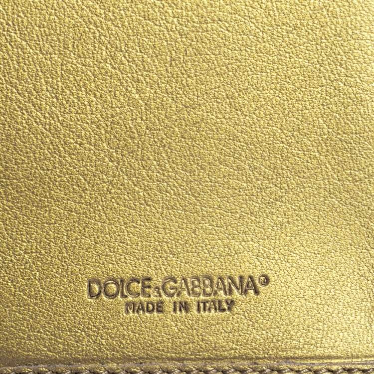 Pre Owned Dolce & Gabbana Metallic Gold Leather Logo Plaque Continental Flap Wallet