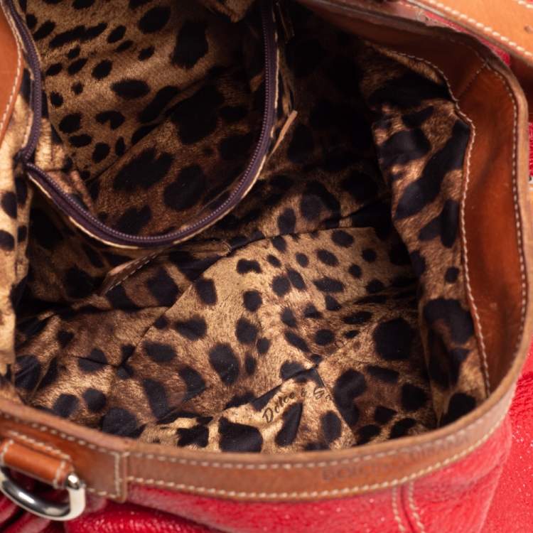 Pre Owned Dolce & Gabbana Red Shimmery Glossy Leather Miss Fluid Hobo