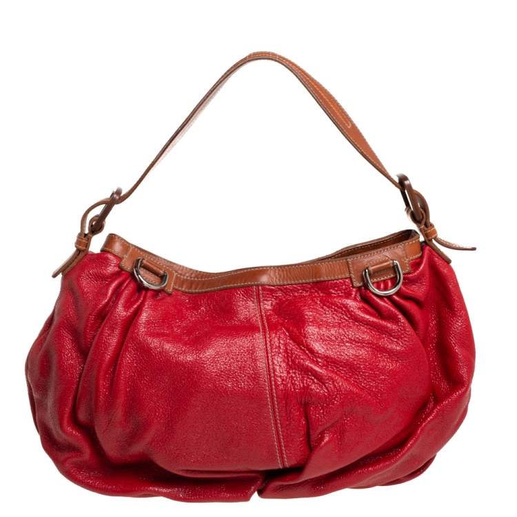 Pre Owned Dolce & Gabbana Red Shimmery Glossy Leather Miss Fluid Hobo