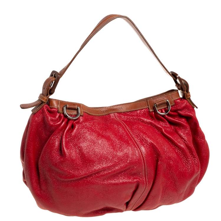 Pre Owned Dolce & Gabbana Red Shimmery Glossy Leather Miss Fluid Hobo
