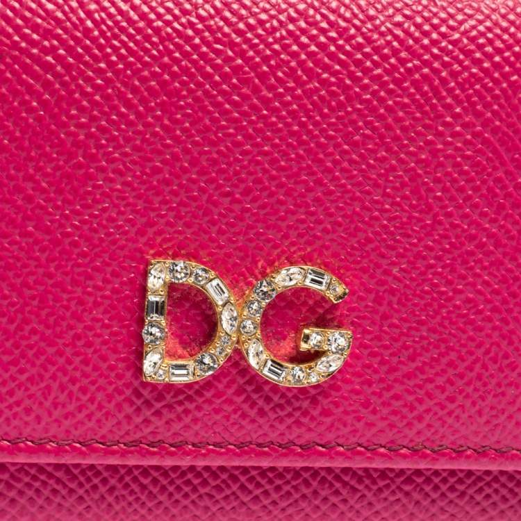 Pre Owned Dolce & Gabbana Fuchsia Leather DG Crystal Embellished Trifold Wallet