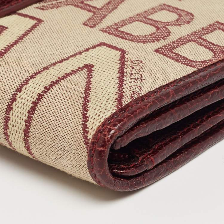 مملوكة مسبقًا Dolce & Gabbana Burgundy Monogram Fabric and Leather D Ring Trifold Wallet
