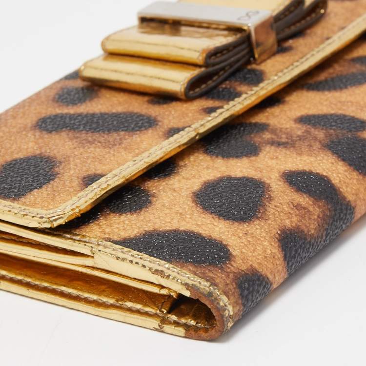 Pre Owned Dolce & Gabbana Gold/Brown Leopard Print Coated Canvas and Laminated Leather Bow Flap Wallet
