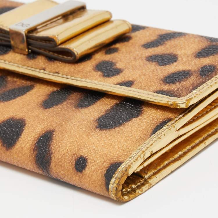 Pre Owned Dolce & Gabbana Gold/Brown Leopard Print Coated Canvas and Laminated Leather Bow Flap Wallet