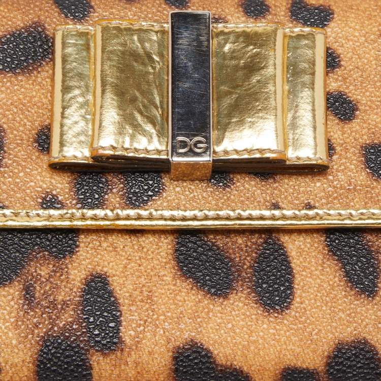 Pre Owned Dolce & Gabbana Gold/Brown Leopard Print Coated Canvas and Laminated Leather Bow Flap Wallet