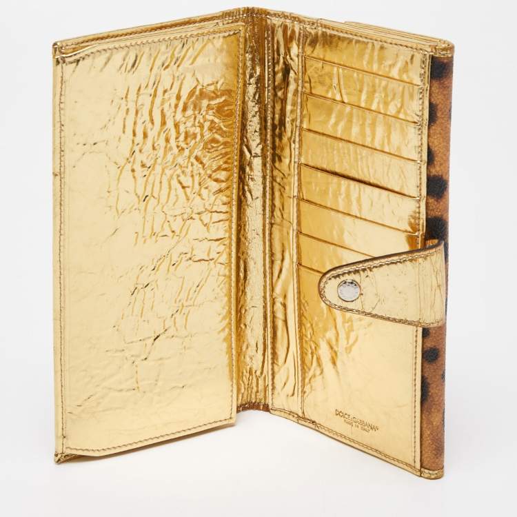 Pre Owned Dolce & Gabbana Gold/Brown Leopard Print Coated Canvas and Laminated Leather Bow Flap Wallet