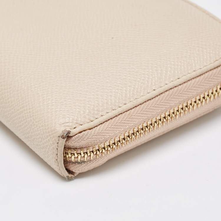 Pre Owned Dolce & Gabbana Beige Leather Lock Zip Around Continental Wallet