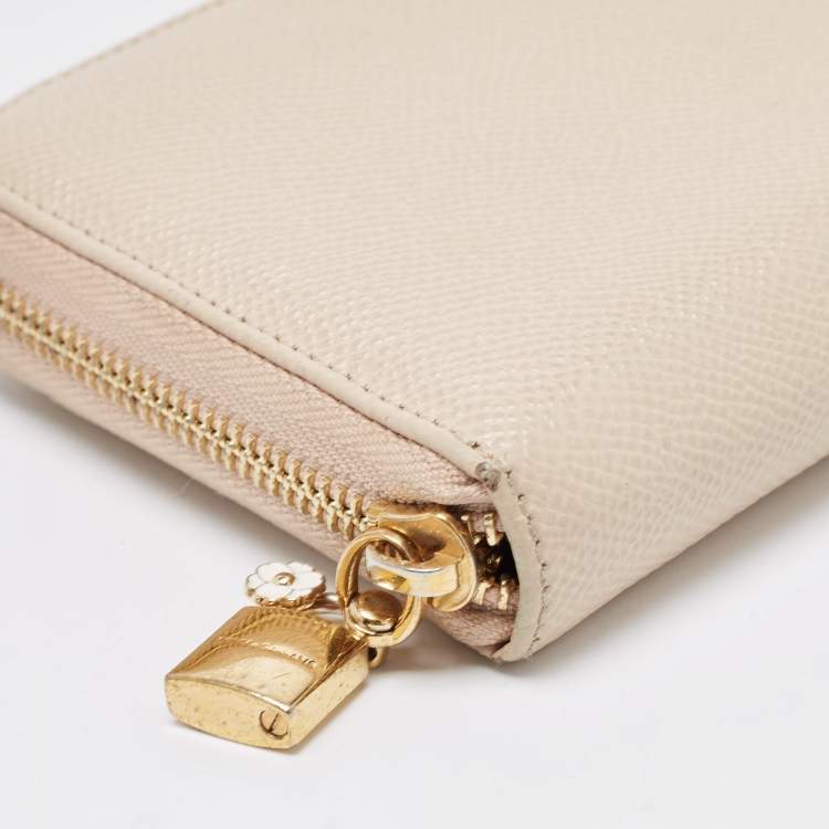 Pre Owned Dolce & Gabbana Beige Leather Lock Zip Around Continental Wallet