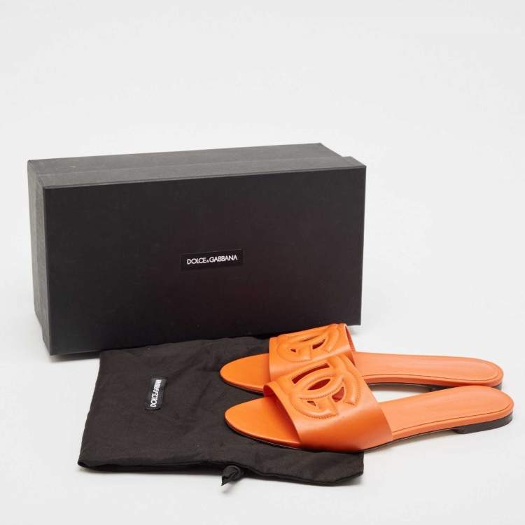 Pre Owned Dolce & Gabbana Orange Leather DG Cut Out Logo Flat Slides Size 39