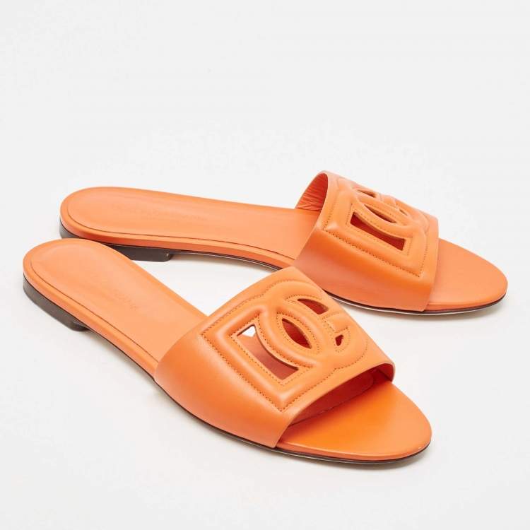 Pre Owned Dolce & Gabbana Orange Leather DG Cut Out Logo Flat Slides Size 39