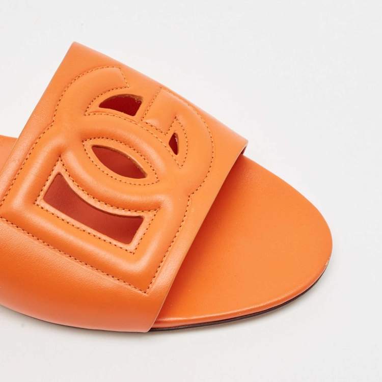 Pre Owned Dolce & Gabbana Orange Leather DG Cut Out Logo Flat Slides Size 39