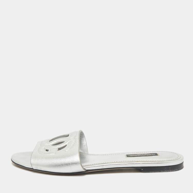 Pre Owned Dolce & Gabbana Metallic Silver Leather Logo Flat Slide Sandals Size 37