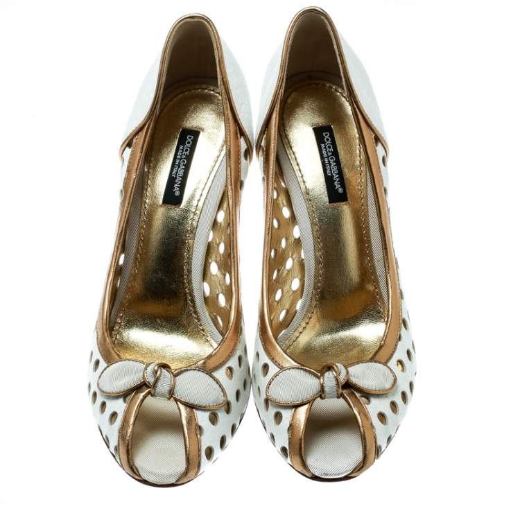 Pre Owned Dolce & Gabbana White/Gold Perforated Leather Bow Detail Peep Toe Pumps Size 36.5
