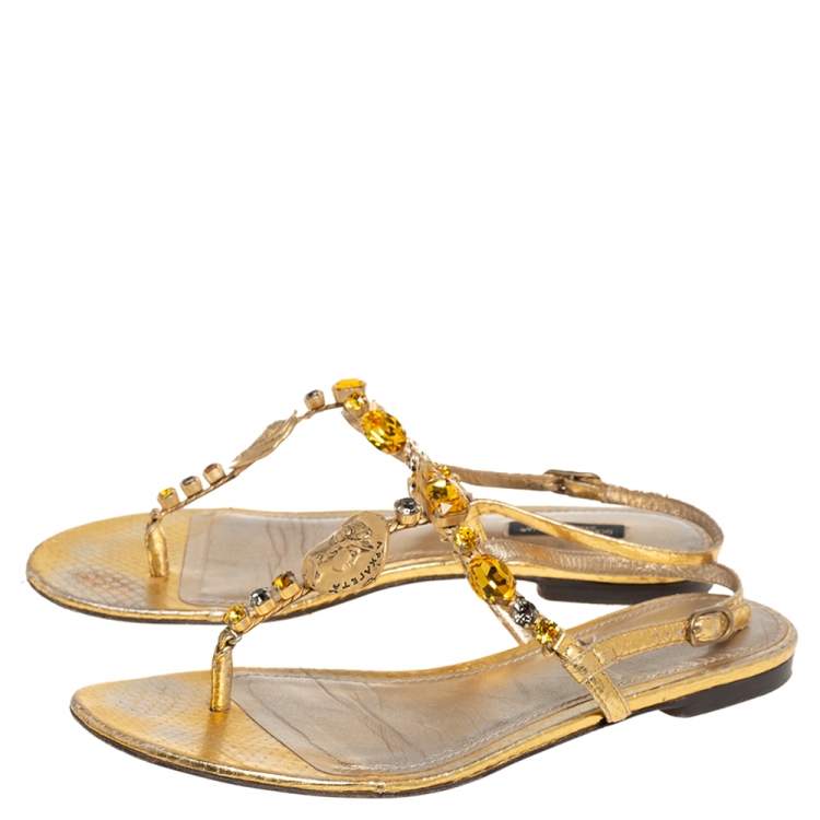 مملوكة مسبقًا Dolce & Gabbana Gold Snakeskin Coin and Crystal Embellished Thong Flats Size 39
