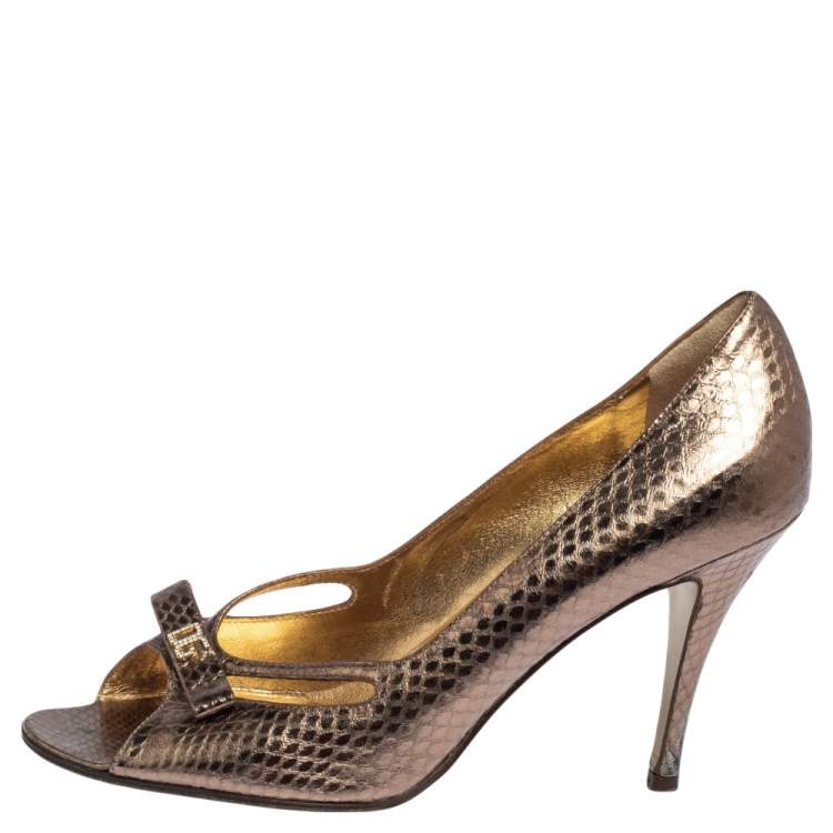Pre Owned Dolce & Gabbana Gold Python Embossed Leather Peep Toe Bow Pumps Size 37.5