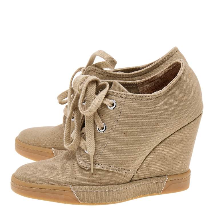 مملوكة مسبقًا Dolce & Gabbana Beige Canvas Lace Up Wedge Sneakers Size 38