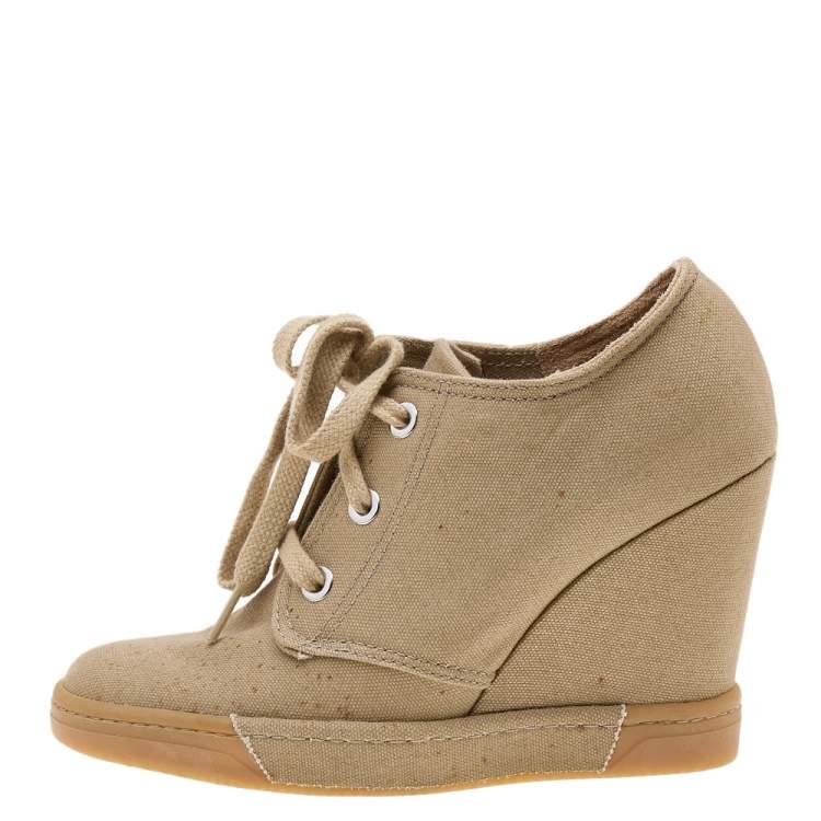 Tan on sale wedge sneakers