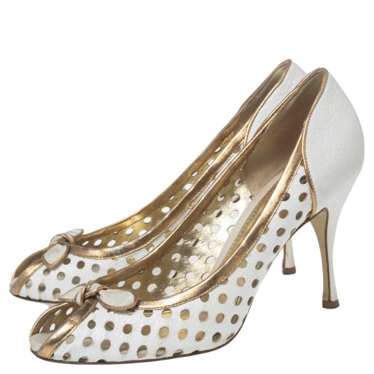 Pre Owned Dolce & Gabbana White/Gold Perforated Leather Bow Detail Peep Toe Pumps Size 41