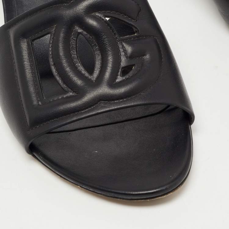 Pre Owned Dolce & Gabbana Black Leather Laser Cut Logo Slide Sandals Size 41