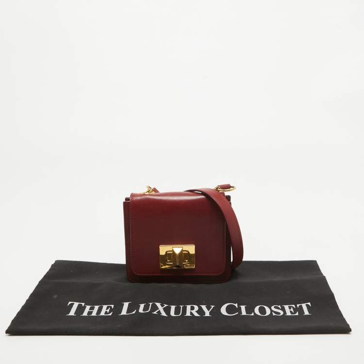مملوكة مسبقًا Emilio Pucci Burgundy Leather Trunlock Flap Crossbody Bag