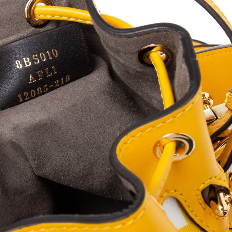 Pre Owned Fendi Yellow/White FF Vertigo Coated Canvas and Leather Mini Mon Tresor Drawstring Bucket Bag