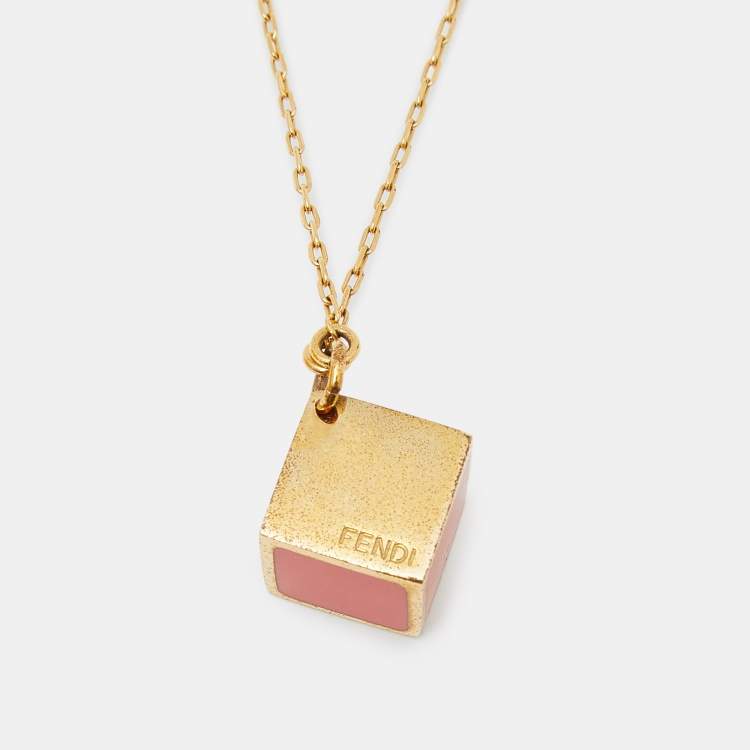 Pre Owned Fendi Red Enamel Cube Gold Tone Pendant Necklace