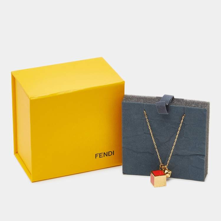 Pre Owned Fendi Red Enamel Cube Gold Tone Pendant Necklace