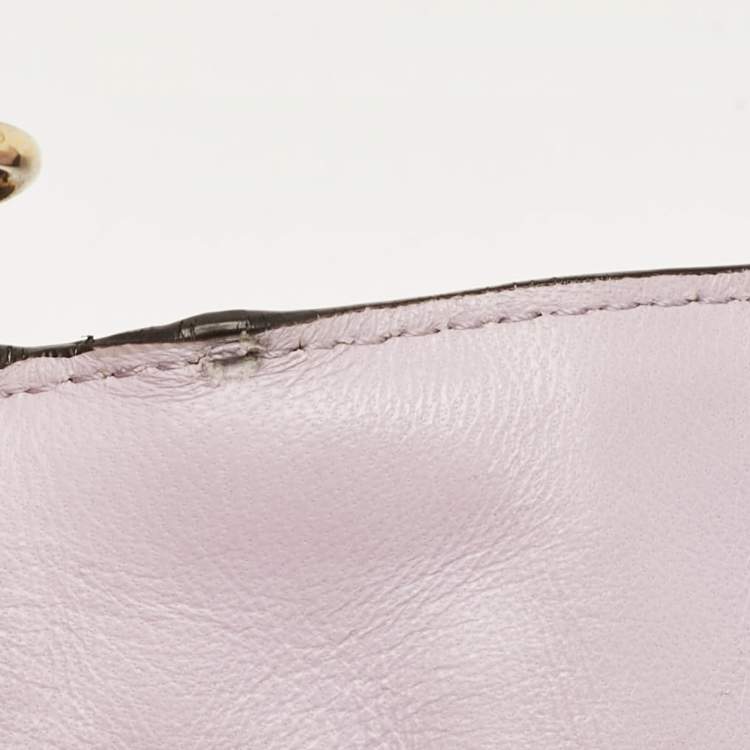 Pre Owned Fendi Lavender FF Logo Embossed Leather Mini Baguette Bag