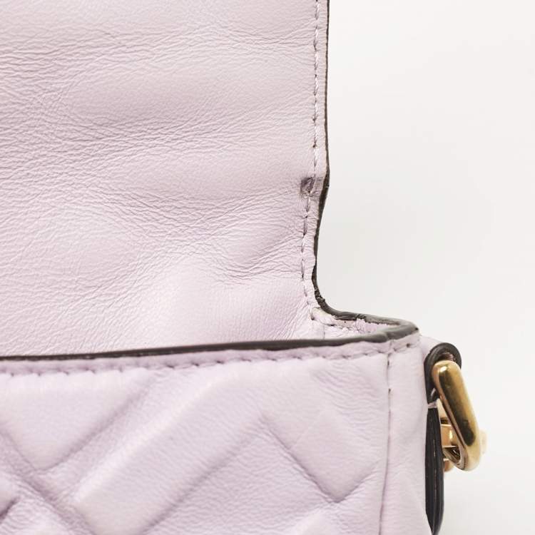 Pre Owned Fendi Lavender FF Logo Embossed Leather Mini Baguette Bag