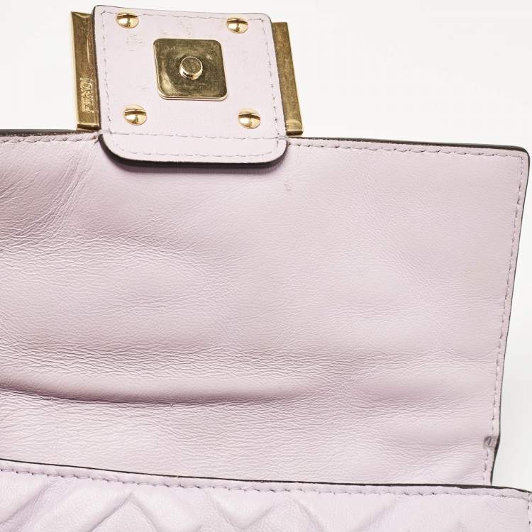 Pre Owned Fendi Lavender FF Logo Embossed Leather Mini Baguette Bag