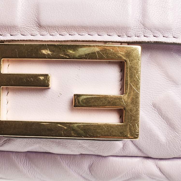 Pre Owned Fendi Lavender FF Logo Embossed Leather Mini Baguette Bag