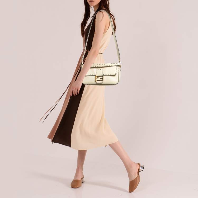 Pre Owned Fendi Beige Leather Metal Stitch Baguette Bag